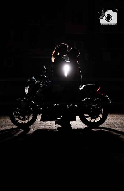 Pre Wedding Shoot Poses kiss on bike